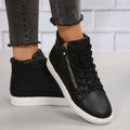 Side view of the Brielle women’s Black Luxe Zip-Wedge High-Top Sneakers shown on foot, featuring a streamlined black lace-up upper, ankle-height construction, textured toe and side panels, metallic zipper accent, hidden wedge-style elevation, rounded toe, and thick white outsole for sleek everyday street-style wear.