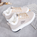 Angled pair view of the Sienna Cozy Plush-Lined Platform Sneakers in Beige, featuring soft light neutral uppers, warm white plush interior lining, coordinating lace-up fronts, rounded toes, and thick white platform soles for feminine Fall and Winter casual outfits.