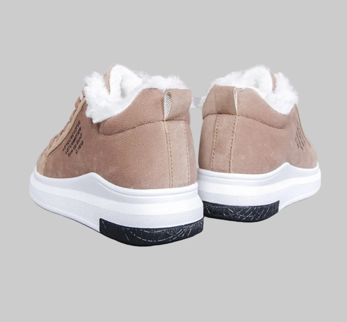 Rear view of the Sienna Cozy Plush-Lined Platform Sneakers in Brown showing the structured heel design, soft plush white lining around the shoe opening, neutral blush taupe upper, and thick white platform outsole designed for cozy cold-weather everyday wear.