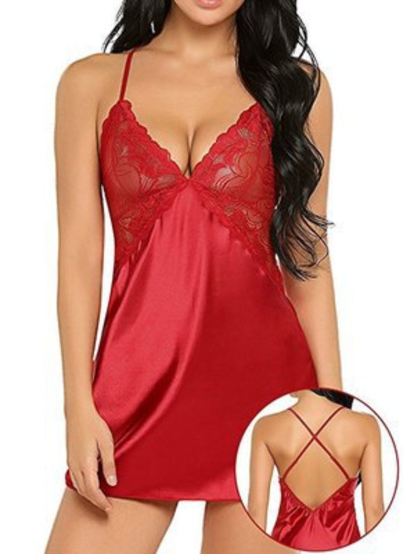 Amara women's ruby red satin-look chemise nightdress displayed on a brunette model, featuring delicate floral lace around the plunging V-neckline, thin adjustable-looking shoulder straps, a small coordinating red bow below the bust, and smooth, glossy red fabric with a gently flowing short hemline. A circular inset shows the back strap construction and satin-look fabric detailing.