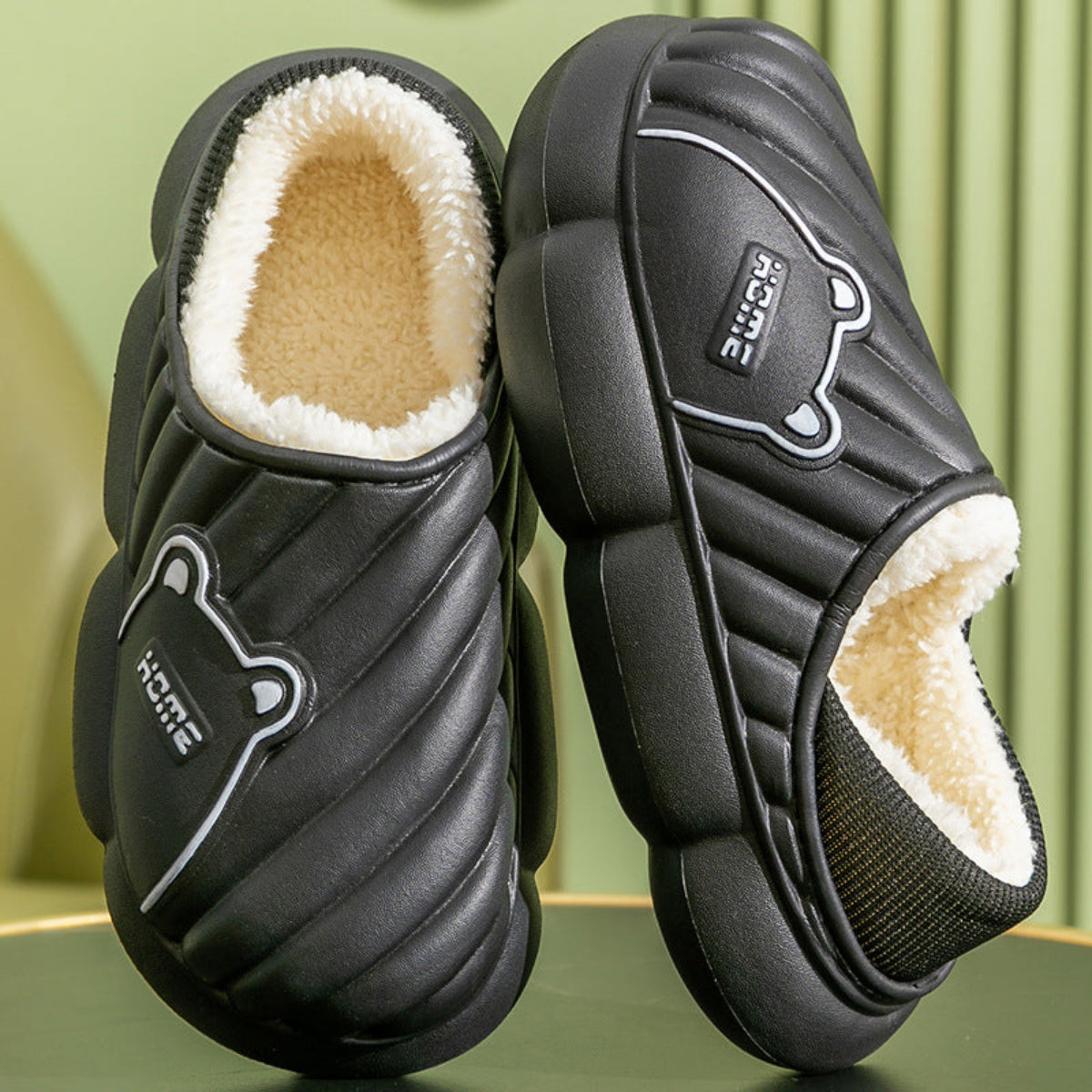 Black quilted plush-lined house slippers for women