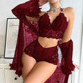 Front view of the Brielle women's wine red three-piece lingerie set shown on a female model, featuring a richly colored lace-detailed bra-style top, matching high-waisted wine red bottoms with decorative lace accents, and a coordinating semi-sheer long-sleeve cover-up draped over the shoulders.