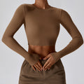 Caramel mocha CloudFlex women’s cropped long-sleeve workout top shown from the front