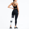 Black Contour Colorblock women’s workout set with sleeveless top and high-waist leggings shown in back view