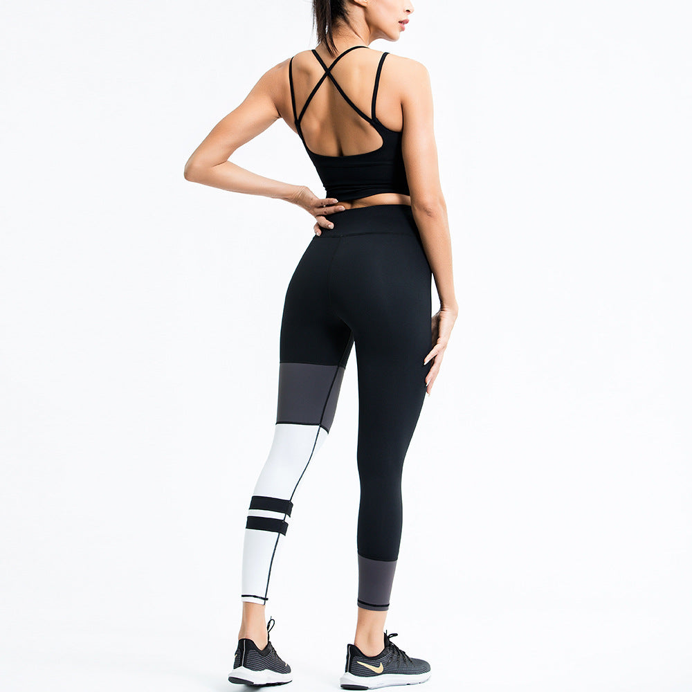 Black Contour Colorblock women’s workout set with sleeveless top and high-waist leggings shown in back view