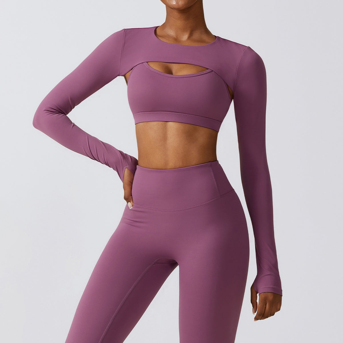 Plum purple Elevate women’s seamless workout set with long-sleeve crop top and high-waist leggings shown from the front