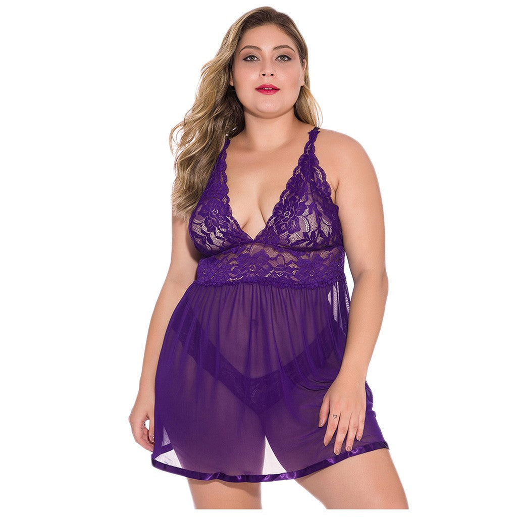 Front view of the Eliana purple lace babydoll nightdress worn by a brunette model, featuring a deep V-shaped neckline with delicate floral lace, narrow shoulder straps, an empire-style underbust seam, and a gently flowing sheer purple mesh skirt with a short hemline.