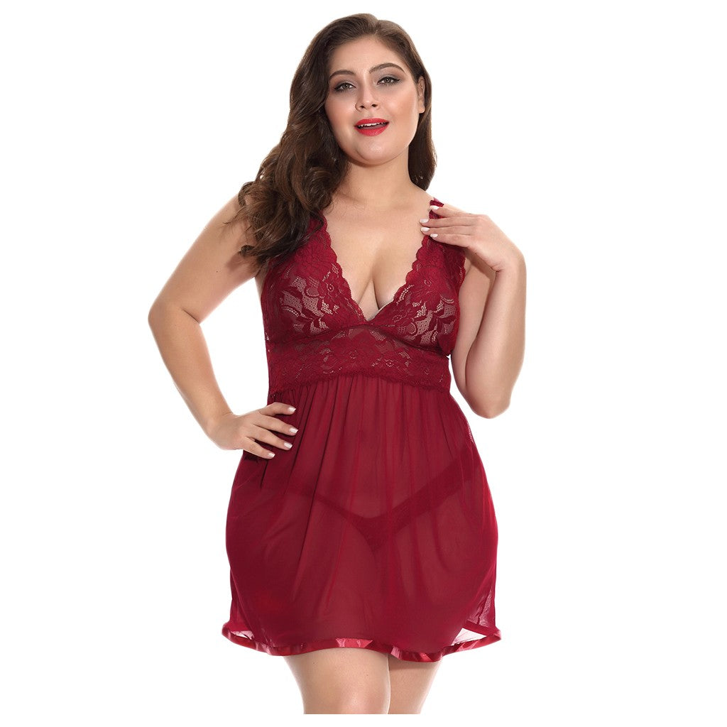 Front view of the Eliana rose red floral lace babydoll nightdress modeled by a curvy woman, featuring a richly colored lace bodice, plunging V-neckline, narrow shoulder straps, and a softly flowing sheer rose red skirt.