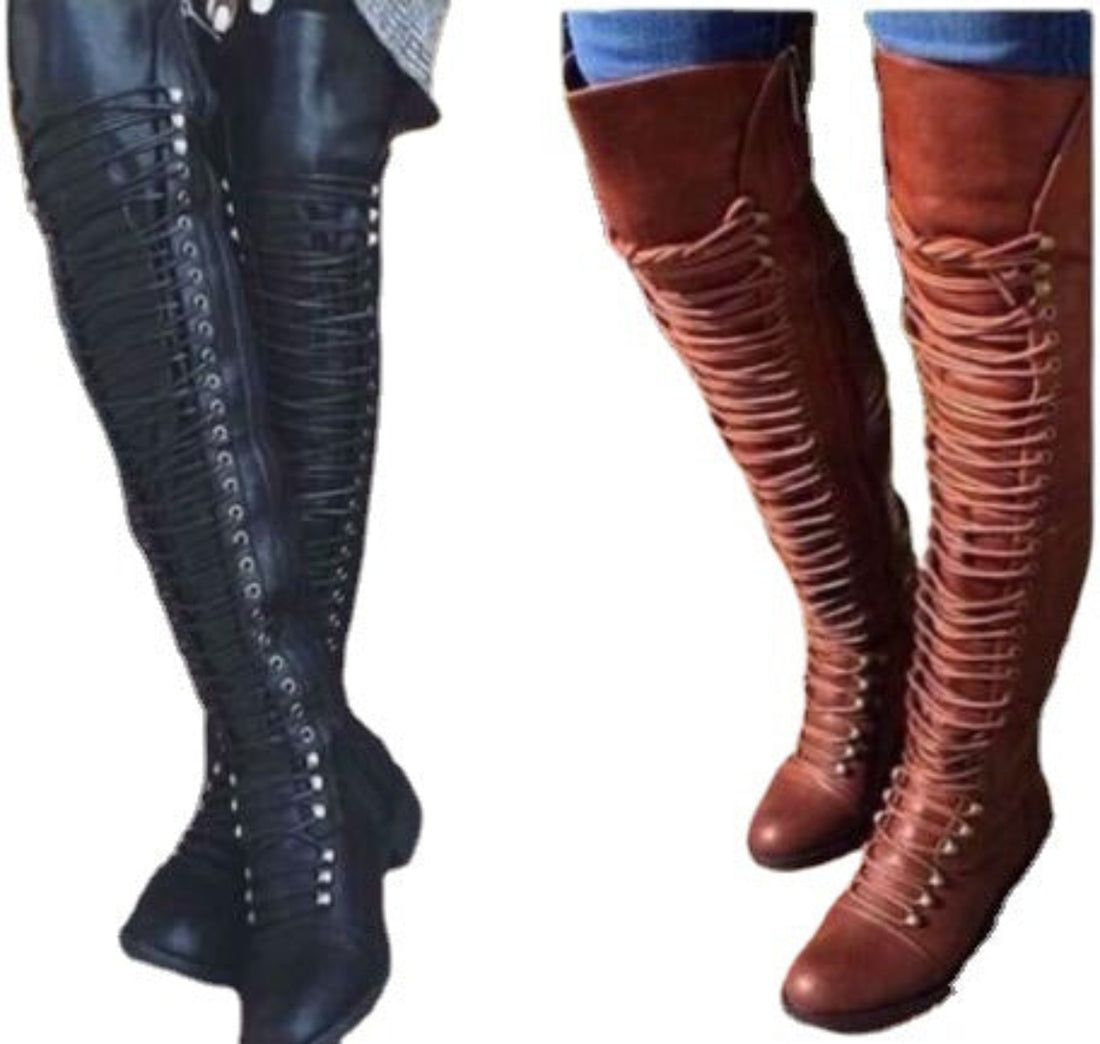 Woman wearing brown Harper cross-strap knee-high boots outdoors, featuring a tall fitted shaft, layered strap detailing, rounded toe, and comfortable block heel styled with blue jeans.