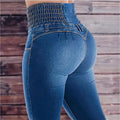 Back view of women's blue high-waist flare jeans with wide smocked waistband and contour stitching