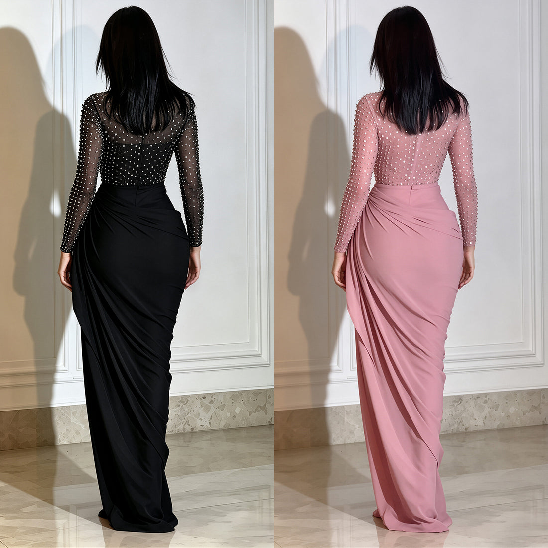 A woman modeling a long black evening gown with a sheer embellished mesh bodice and a draped floor-length skirt, standing against a white paneled wall.