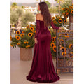 Back view of burgundy lace corset evening gown with long sheer sleeves and floor-length satin skirt.