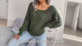 Model showcasing a green cable knit sweater with button details