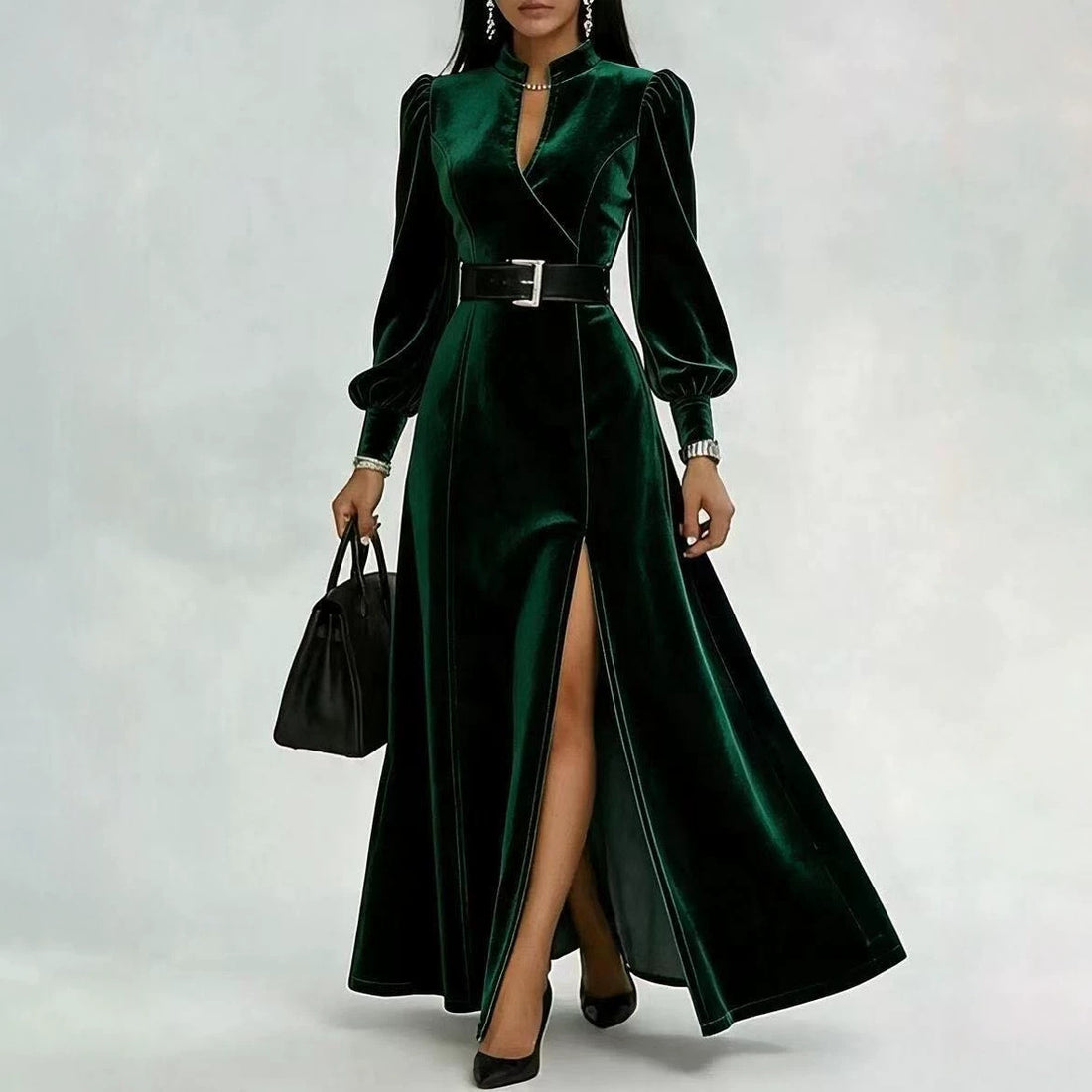 Deep red velvet belted maxi dress with long sleeves and a dramatic front slit.