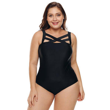 Sasha women's solid black one-piece swimsuit shown from the front on a model, featuring a fitted sleeveless bodice, high rounded neckline, multiple narrow crisscross black straps arranged across the upper chest, and a smooth black lower swimsuit silhouette.