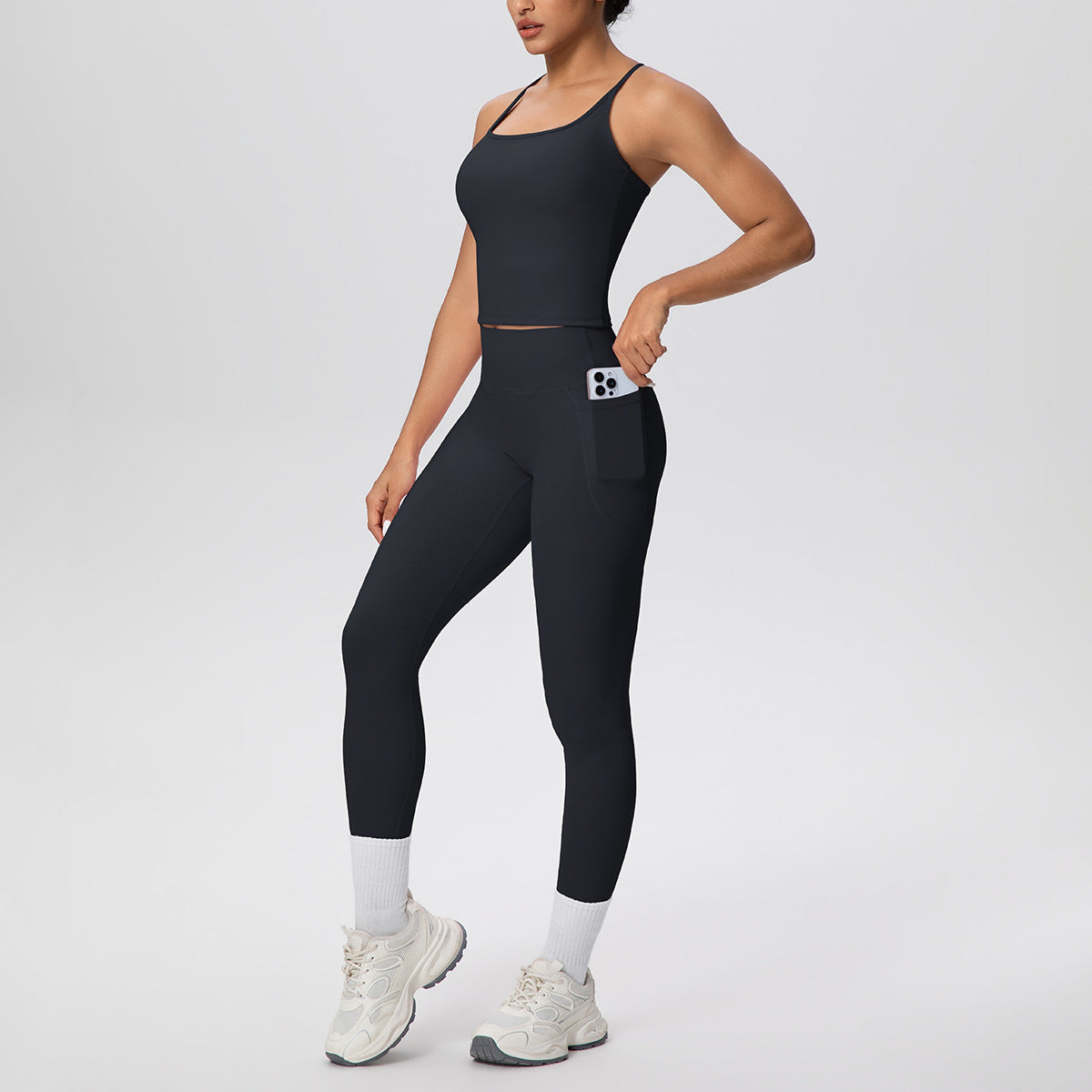 Black Sculpt & Define high-waist women’s activewear set with fitted sleeveless top and full-length leggings