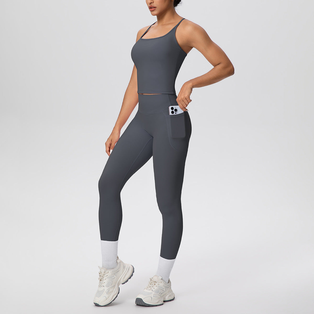 Gray Sculpt & Define high-waist women’s activewear set with fitted sleeveless top and full-length leggings