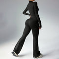 Black Sculpted Silhouette women’s long-sleeve fitness jumpsuit with flared legs shown in back view