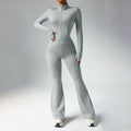 Ivory Sculpted Silhouette women’s long-sleeve fitness jumpsuit with flared legs