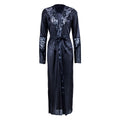 Product-only front view of the Seraphina women's classic black long satin-look robe displayed against a white background, featuring a deep V-shaped wrap neckline with dark floral lace trim, long sleeves with relaxed cuffs, a matching black fabric waist belt tied at the front, and a flowing full-length silhouette with a gently overlapping front opening.