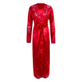 Product-only front view of the Seraphina red satin-look long robe displayed against a white background, featuring glossy red fabric, a deep wrap-style V-neckline with decorative lace trim, long relaxed sleeves, a coordinating red waist sash tied at the front, and a flowing ankle-to-floor-length silhouette with a straight, softly draped hemline.