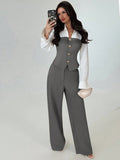 Sloane women's gray two-piece tailored pants set shown from the front, featuring a fitted gray vest with a V-neckline and front buttons, a white long-sleeve blouse with flared cuffs, and matching high-waisted gray wide-leg trousers.