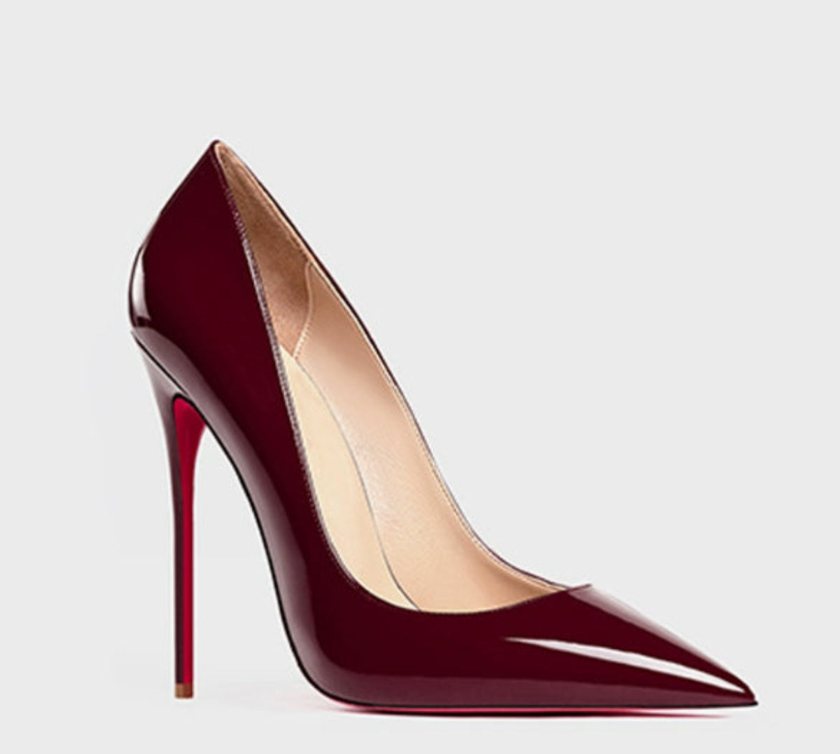 Burgundy Valentina Red-Sole Patent Pointed-Toe Stiletto Pump featuring a deep wine-toned glossy finish, sharply pointed toe, elegant low-cut upper, slender heel, and contrasting red sole.