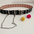 Women’s black double-row grommet belt laid flat with silver-tone hanging chain and buckle