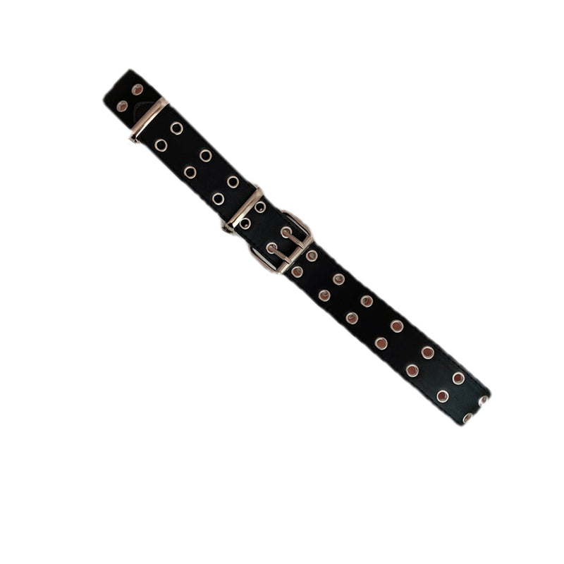 Full view of women’s black double-row grommet belt with silver-tone hardware