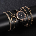Women's black mesh watch with rose gold case and coordinating gold-tone bracelet jewelry set