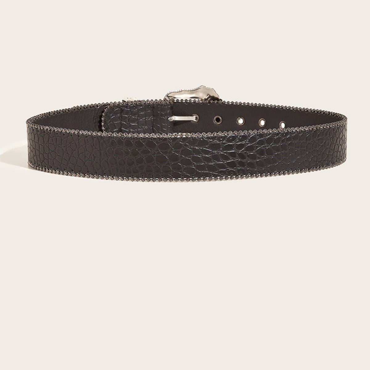 Back view of women’s black textured Western belt showing adjustable holes and silver-tone trim