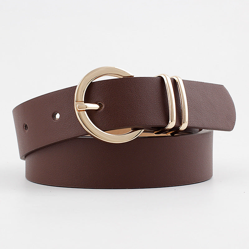 Women’s classic black waist belt with polished gold-tone round buckle