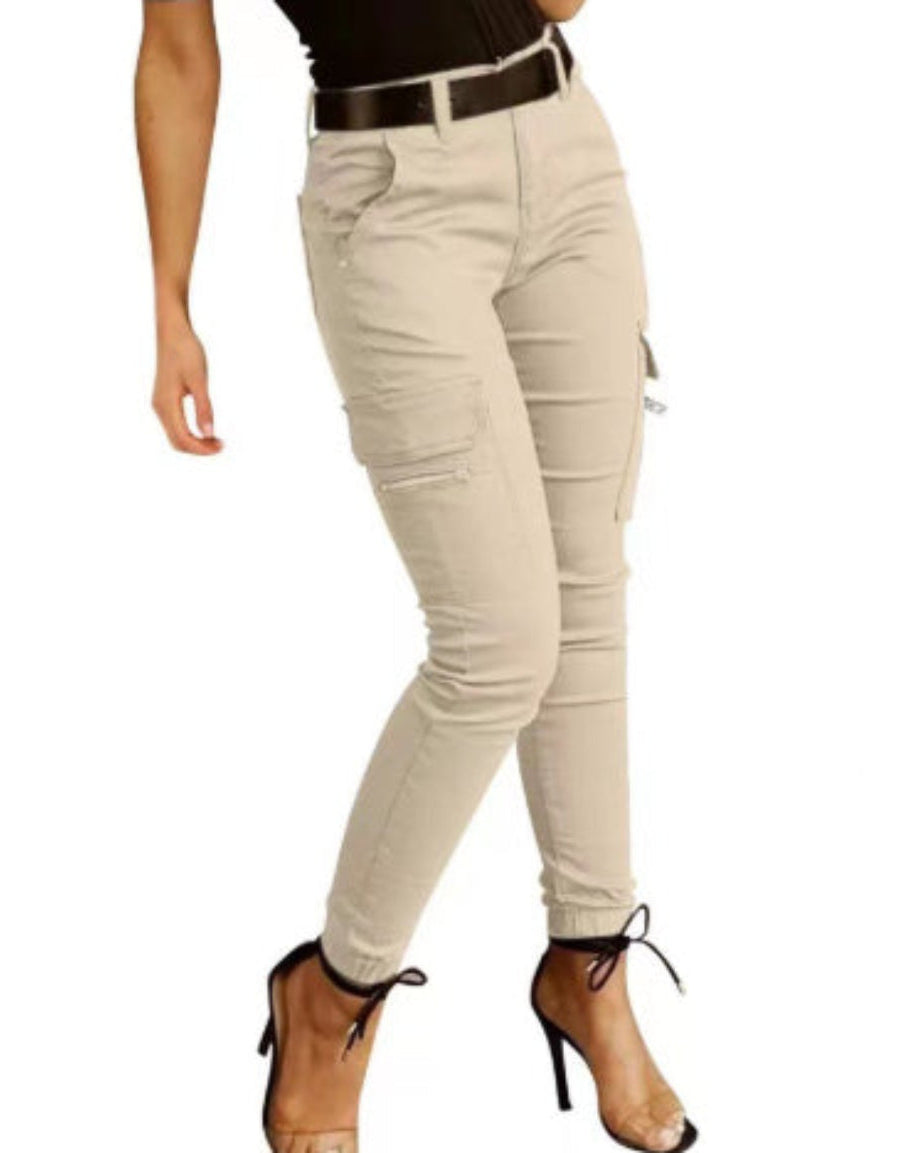 Women's light beige high-waist slim cargo pants with side utility pockets and tapered ankle fit