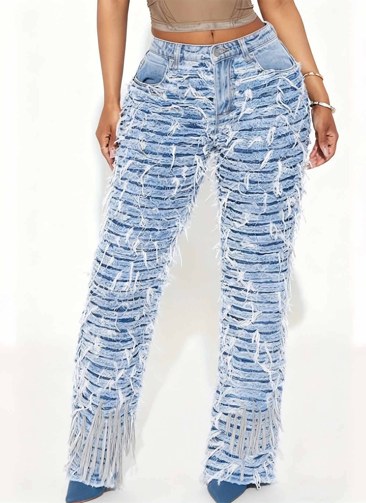 Women's light wash high-waist extreme distressed straight-leg jeans with fringe detail, front view