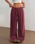 Women's wine red high-waist drawstring wide-leg pants with textured fabric and relaxed fit