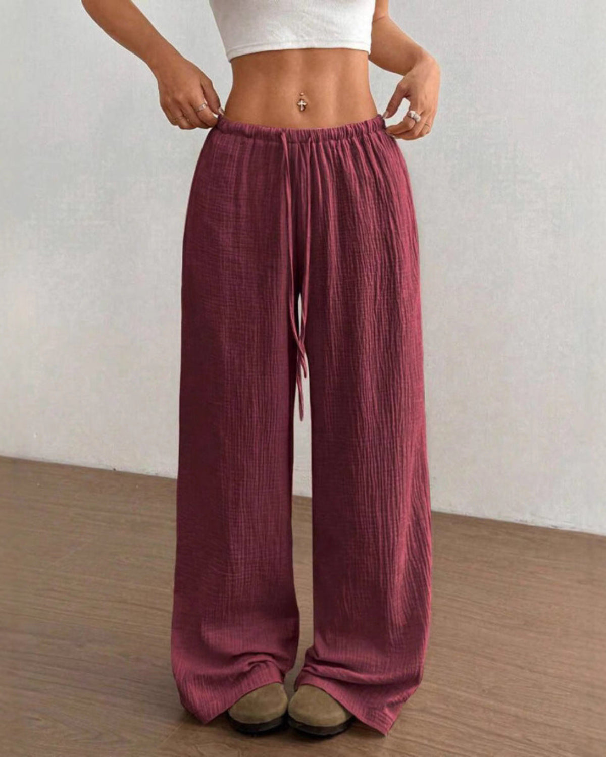 Women's wine red high-waist drawstring wide-leg pants with textured fabric and relaxed fit